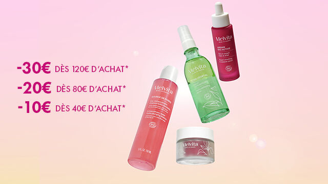soins Melvita visage et corps en lévitation sur un fond en dégradé du rose au jaune