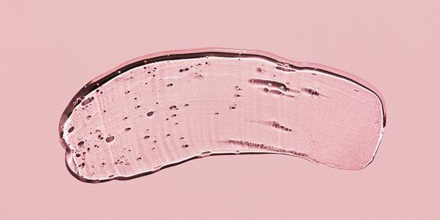 Texture acide hyaluronique sur fond rose